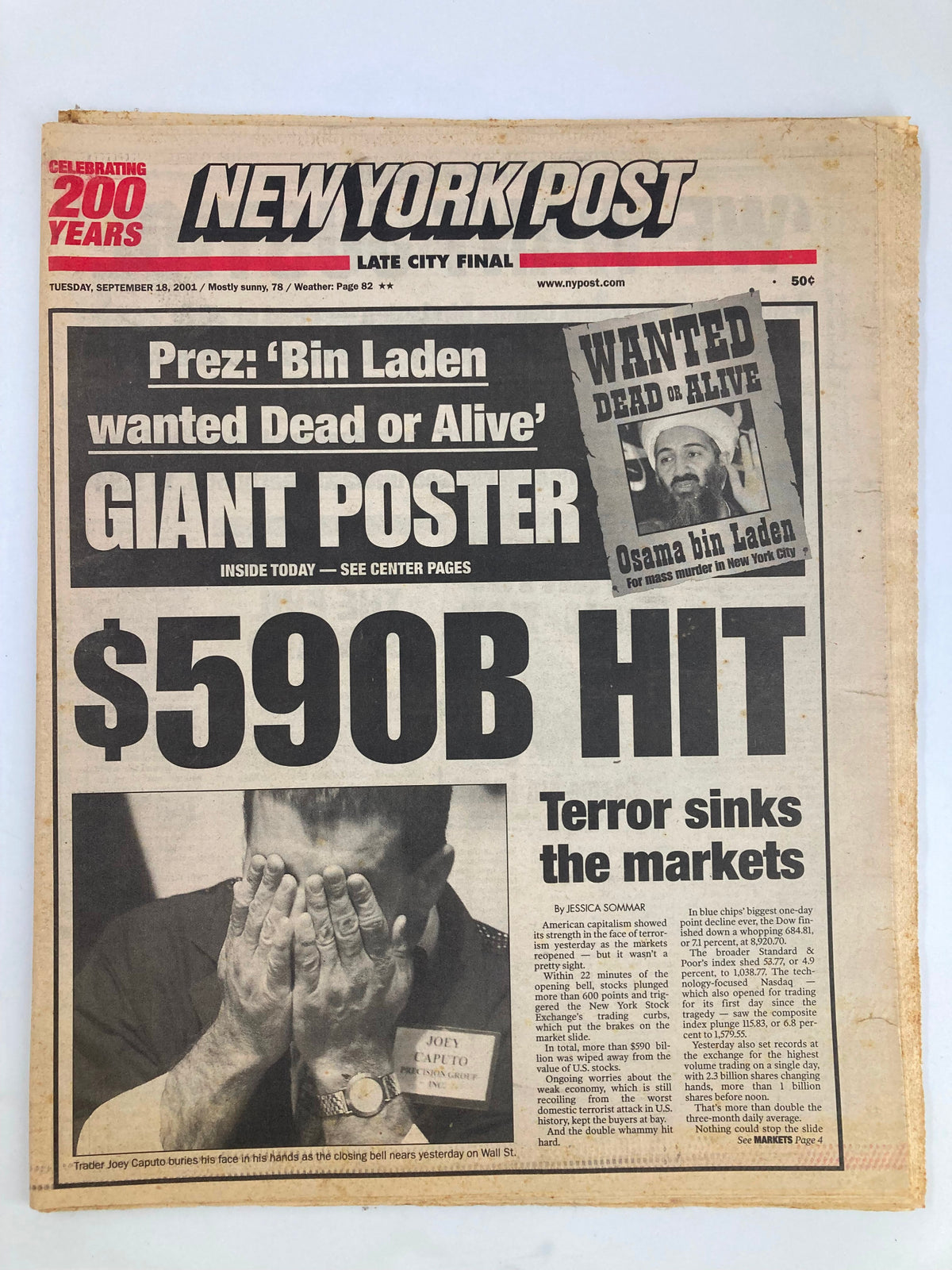 New York Post newspaper front page from September 18, 2001, featuring a headline about Osama Bin Laden, a wanted poster, and the financial crisis news - $590 billion hit.