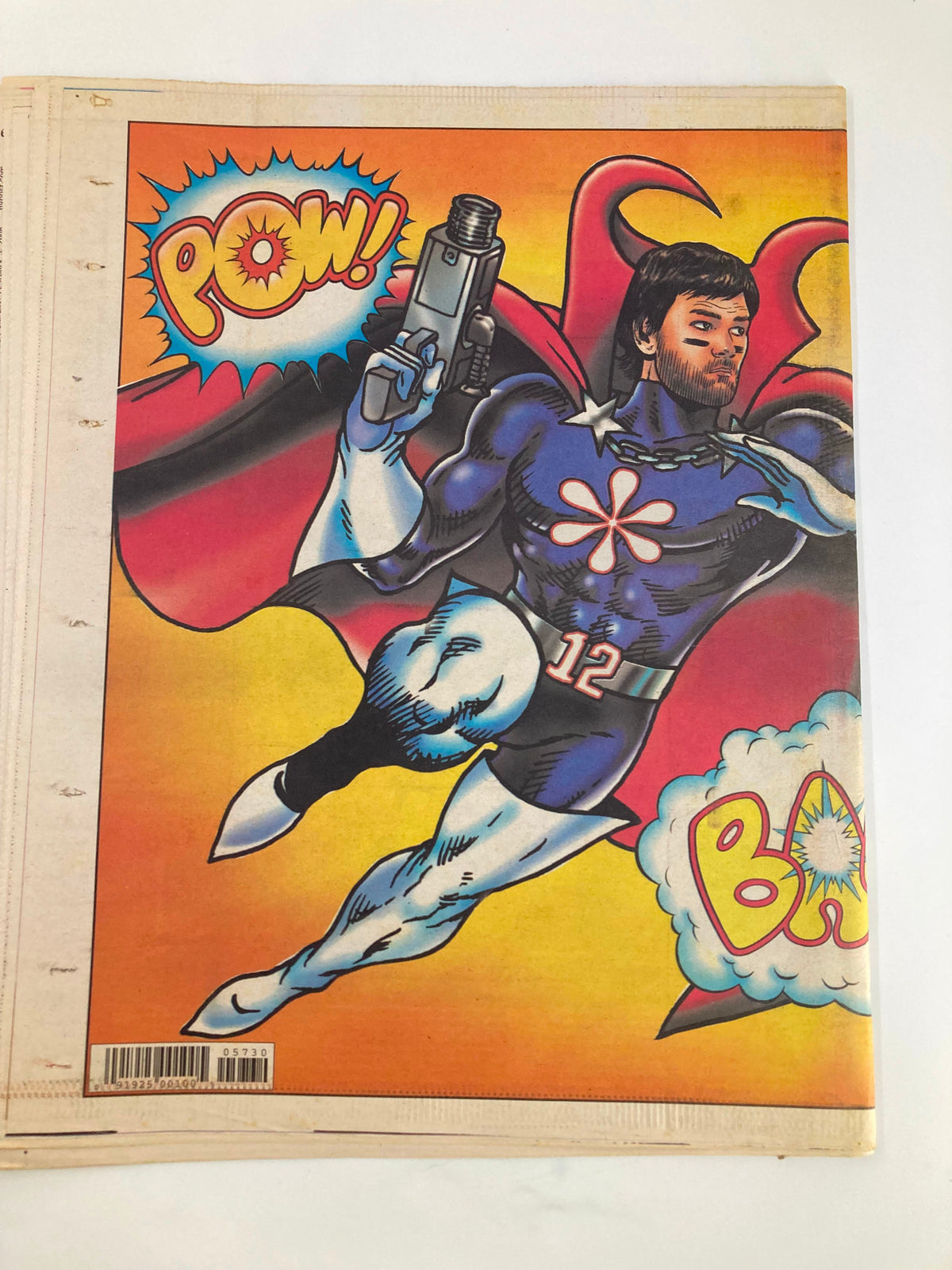 New York Post Newspaper, February 3, 2008, displaying a superhero character in colorful costume, holding guns with the title 'POW!' and 'BAM!', associated with football excitement.
