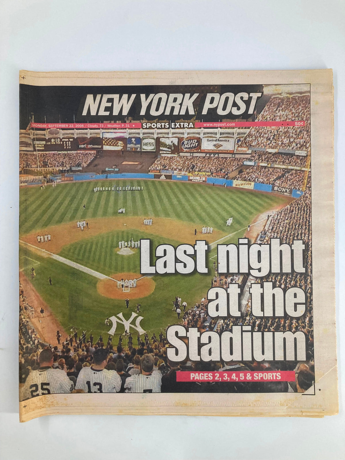 New York Post Newspaper September 22 2008 featuring a photo of Yankee Stadium during the last night at the Stadium, with fans enjoying a baseball game.