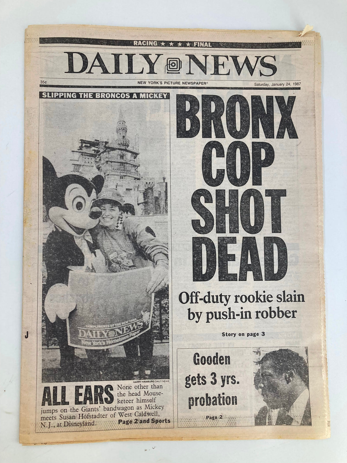 VTG Daily News Newspaper January 24 1987 featuring headlines about a Bronx cop shot dead and an image of Disneyland's Mickey Mouse with off-duty police officers. Good condition with minor wear.