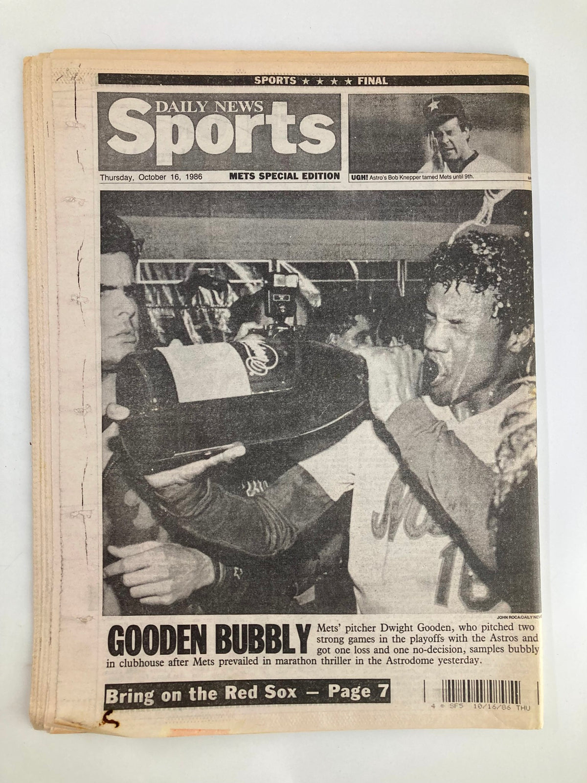 VTG Daily News Newspaper October 16 1986 showcasing Mets' pitcher Dwight Gooden celebrating with teammates, headline 'GOODEN BUBBLY' reflecting the team's victory in the playoffs.