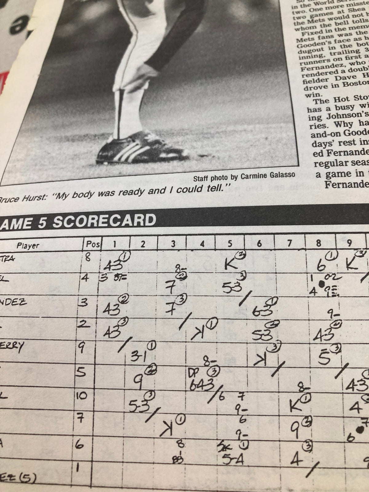 Close-up image of a handwritten scorecard from a baseball game, published in The Record newspaper on October 30, 1986, detailing player positions and scores.