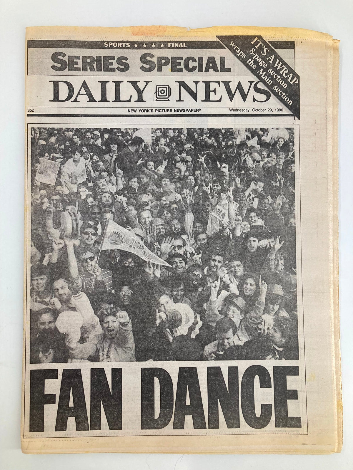 VTG Daily News Newspaper from October 29, 1986, featuring a crowd celebration with the headline 'FAN DANCE' reflecting the excitement of the 1986 World Series.