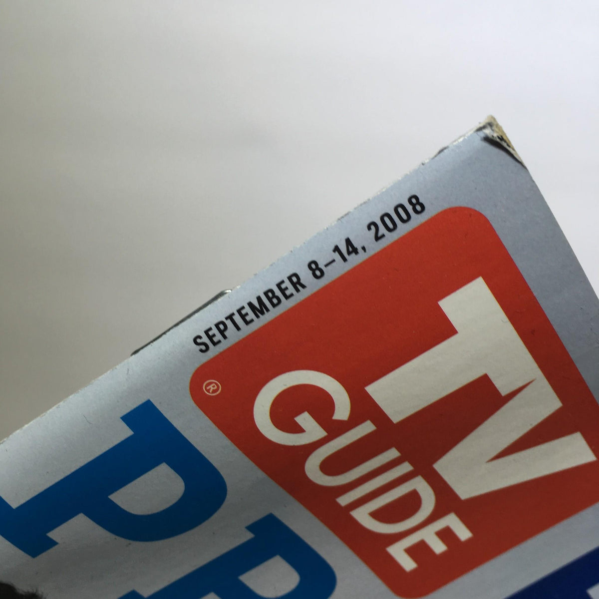 Close-up of the spine of the TV Guide magazine, displaying the date 'September 8-14, 2008', highlighting its vintage nature and significance in television history.