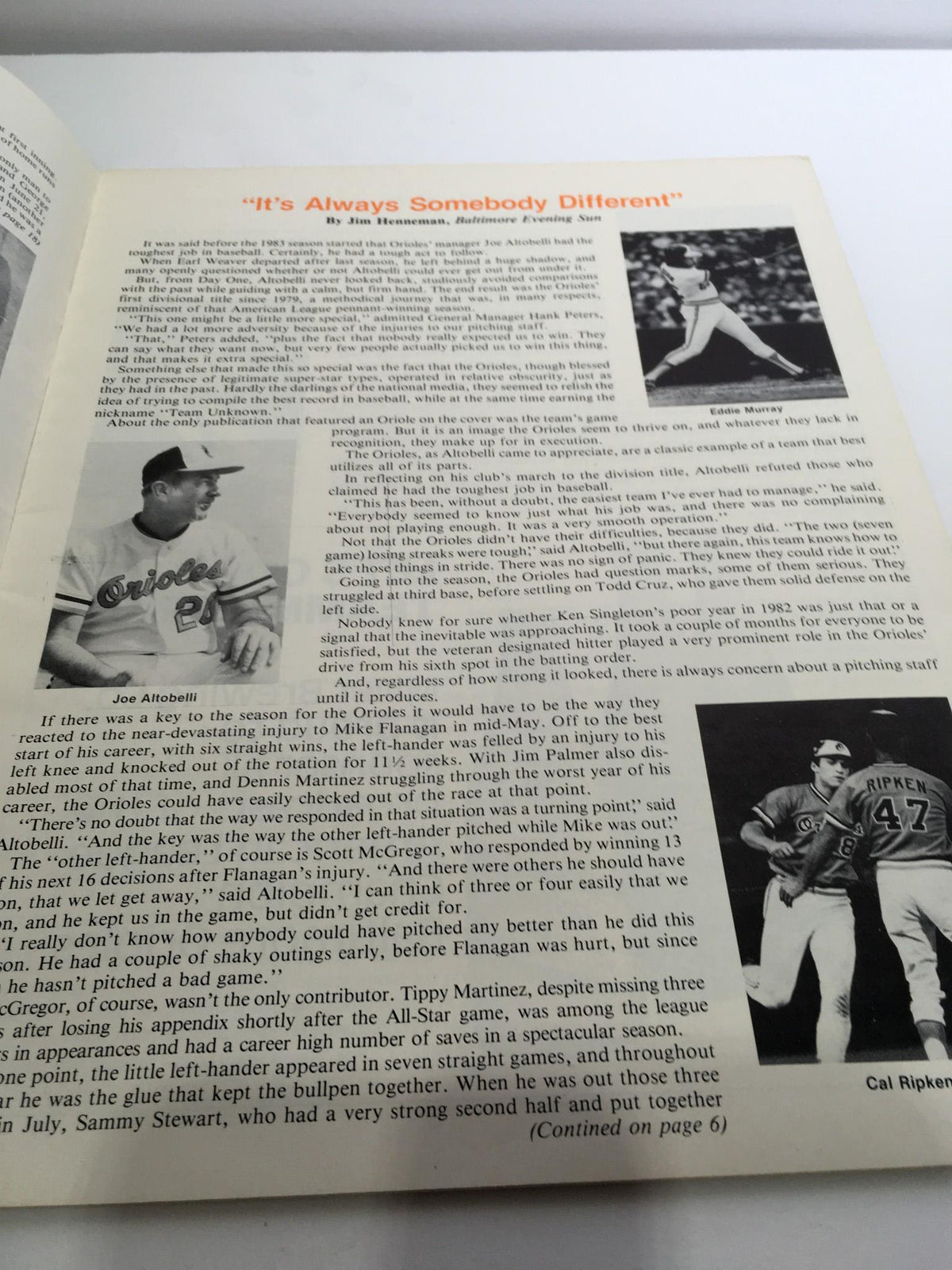 Inside page excerpt from the 1983 ALCS program, detailing players and their performance, including Joe Altobelli and Eddie Murray, emphasizing the team's dynamics.