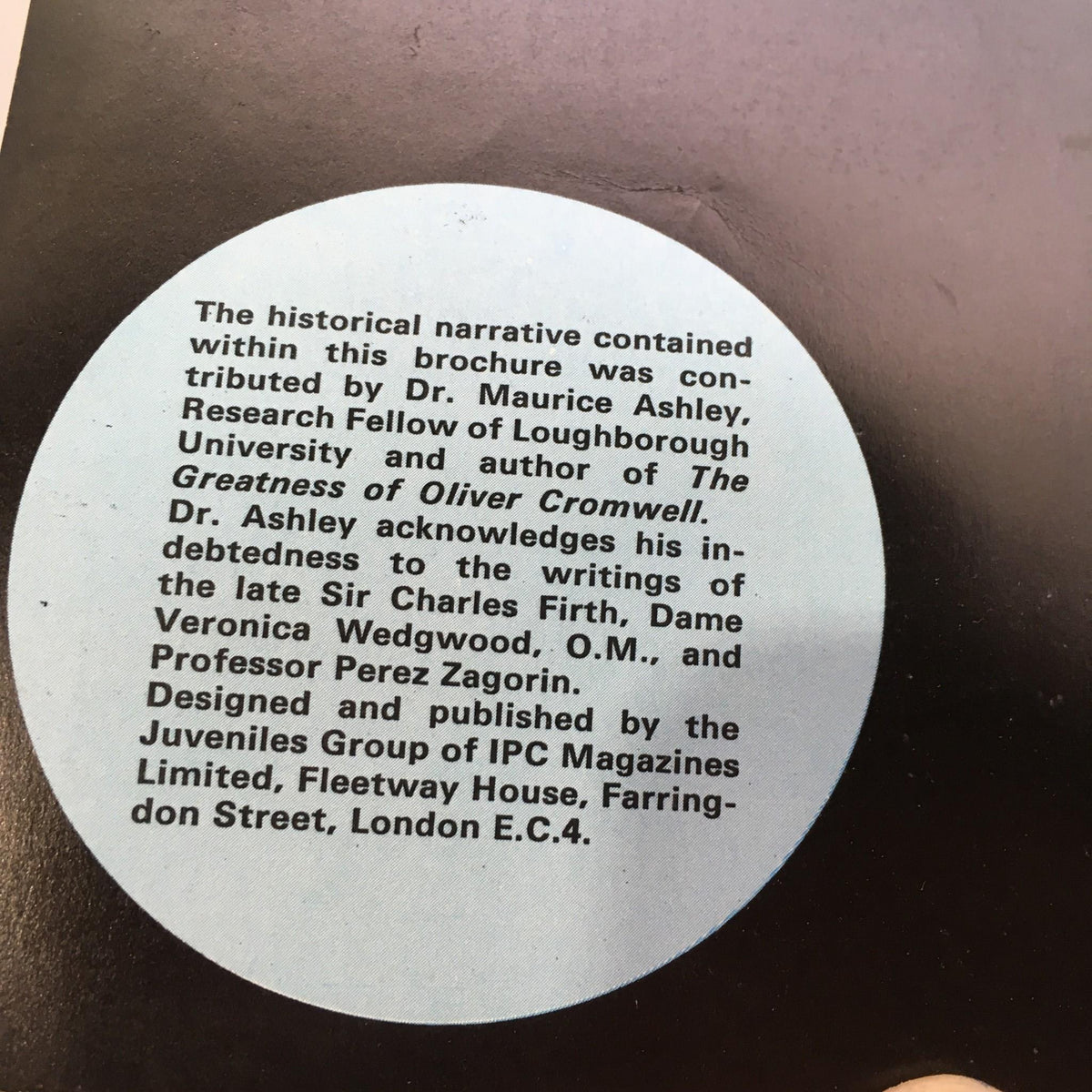 Back cover of Cromwell Magazine by Dr. Maurice Ashley, showing a circular badge with text acknowledging contributions to the magazine and its historical significance.