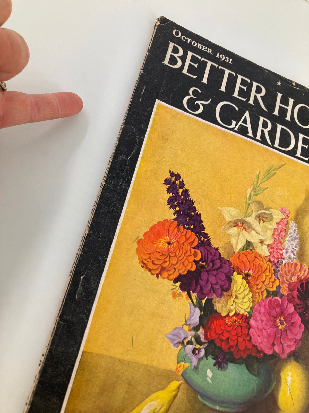 Side view of VTG Better Homes & Gardens Magazine October 1931, highlighting its colorful floral cover design and minor wear.