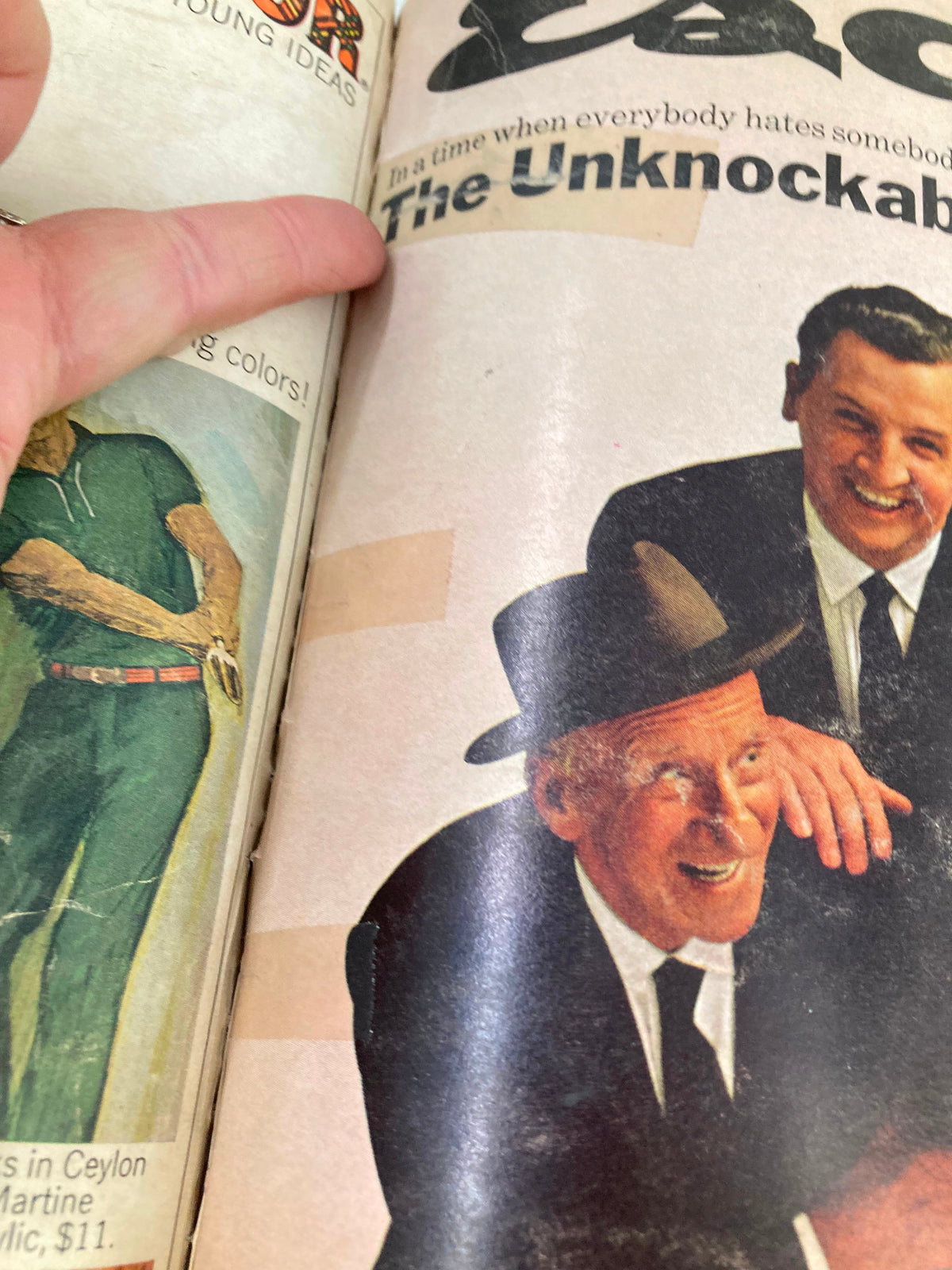 Close-up view of VTG Esquire Magazine from June 1966, focusing on the 'The Unknockables' title with a highlighted finger pointing at the text.