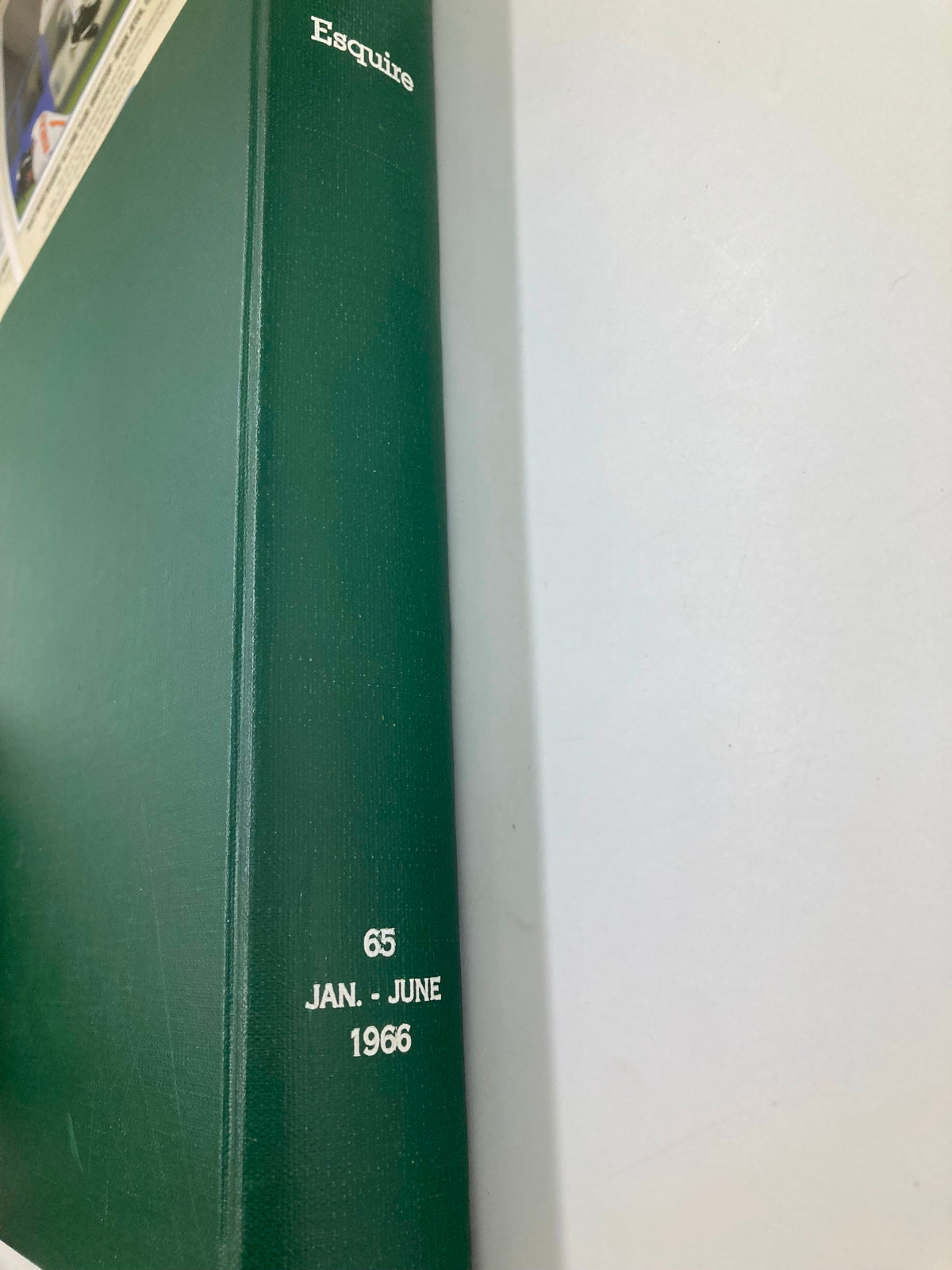 Side view of the library-bound VTG Esquire Magazine collection, showcasing the spine titled '65 JAN. JUNE 1966'.