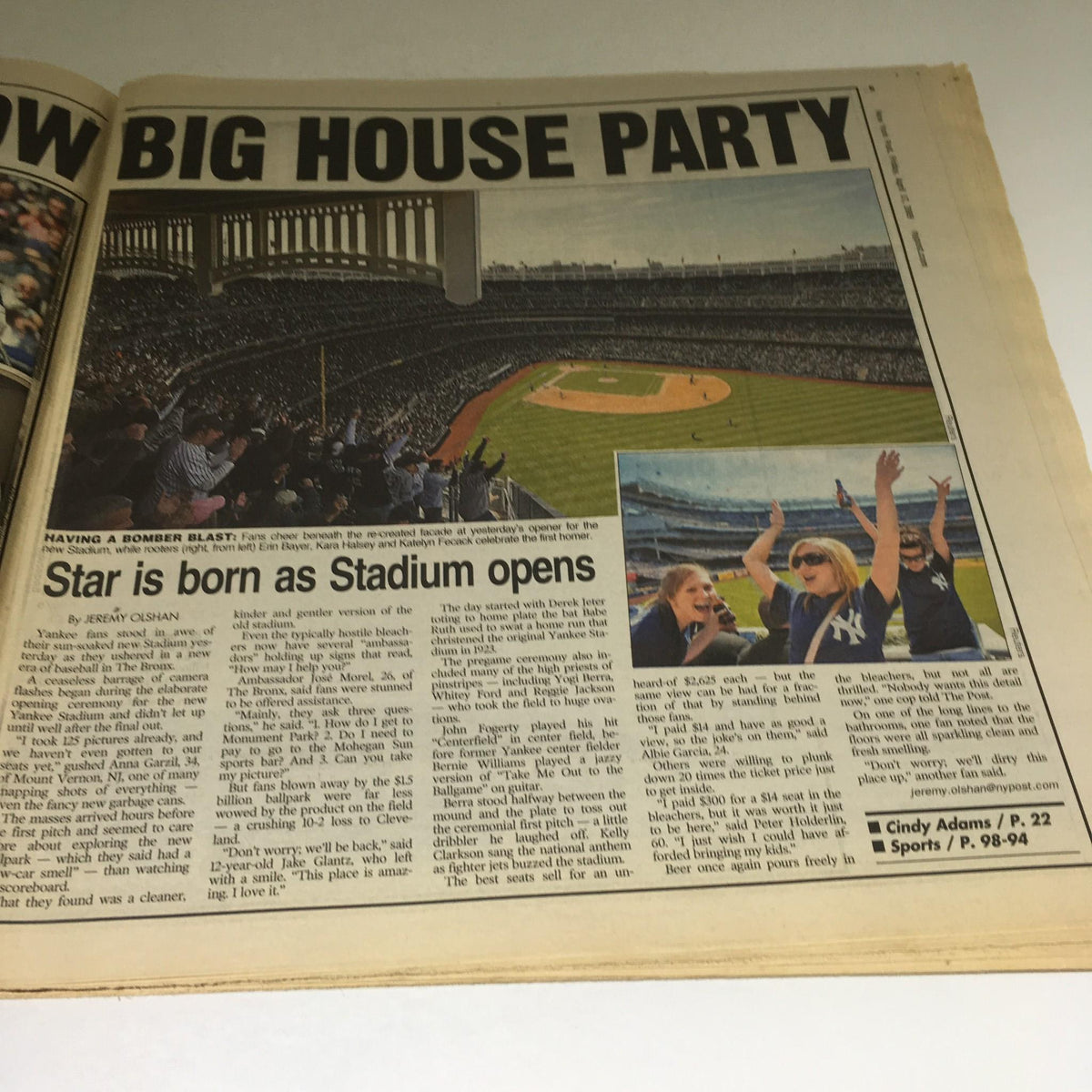 Inside page of the April 17, 2009 New York Post, detailing the celebration of the Yankees' stadium opening with fans enjoying the event.