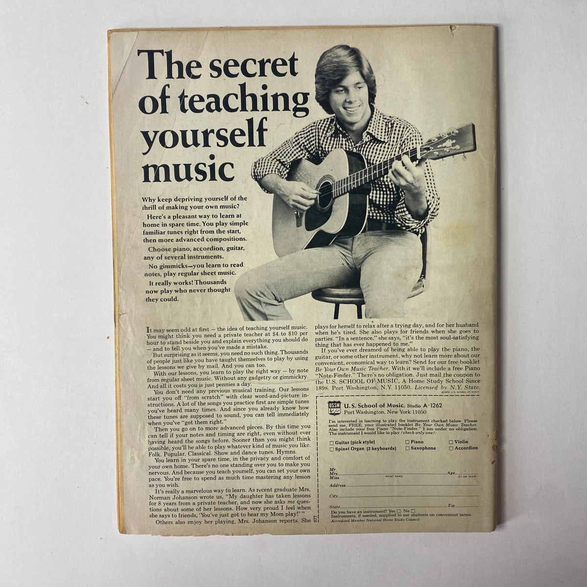 International Boxing Magazine April 1973 featuring Muhammad Ali on the cover, showcasing an article about teaching yourself music with a guitarist and educational content.