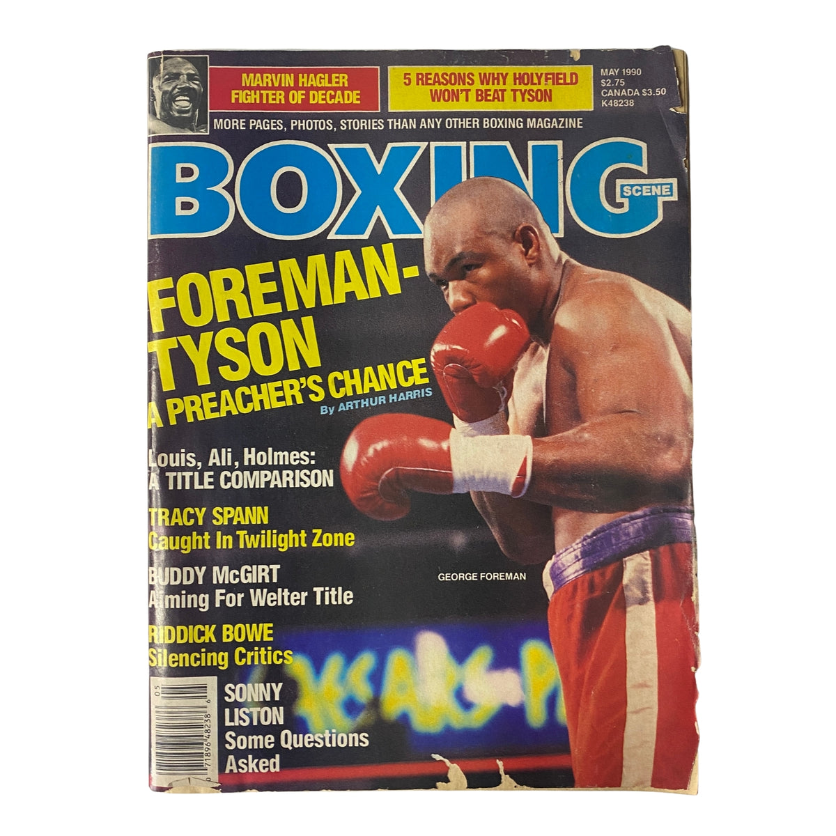 Cover of Boxing Scene Magazine May 1990 featuring George Foreman and Mike Tyson, showcasing the headline 'Foreman-Tyson: A Preacher's Chance'. The image also highlights articles on Marvin Hagler, Buddy McGirt, Riddick Bowe, and more, emphasizing key boxing stories from that era.