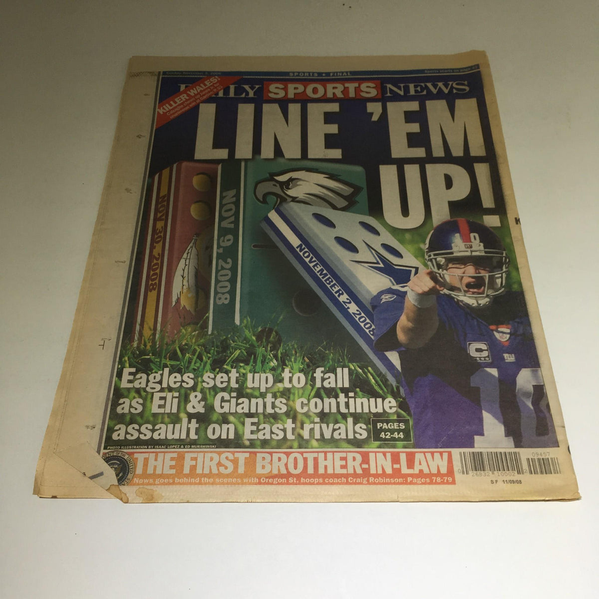 Another edition of the Daily News titled 'LINE 'EM UP!', displaying sports coverage from November 2008, showcasing the Eagles and Giants.