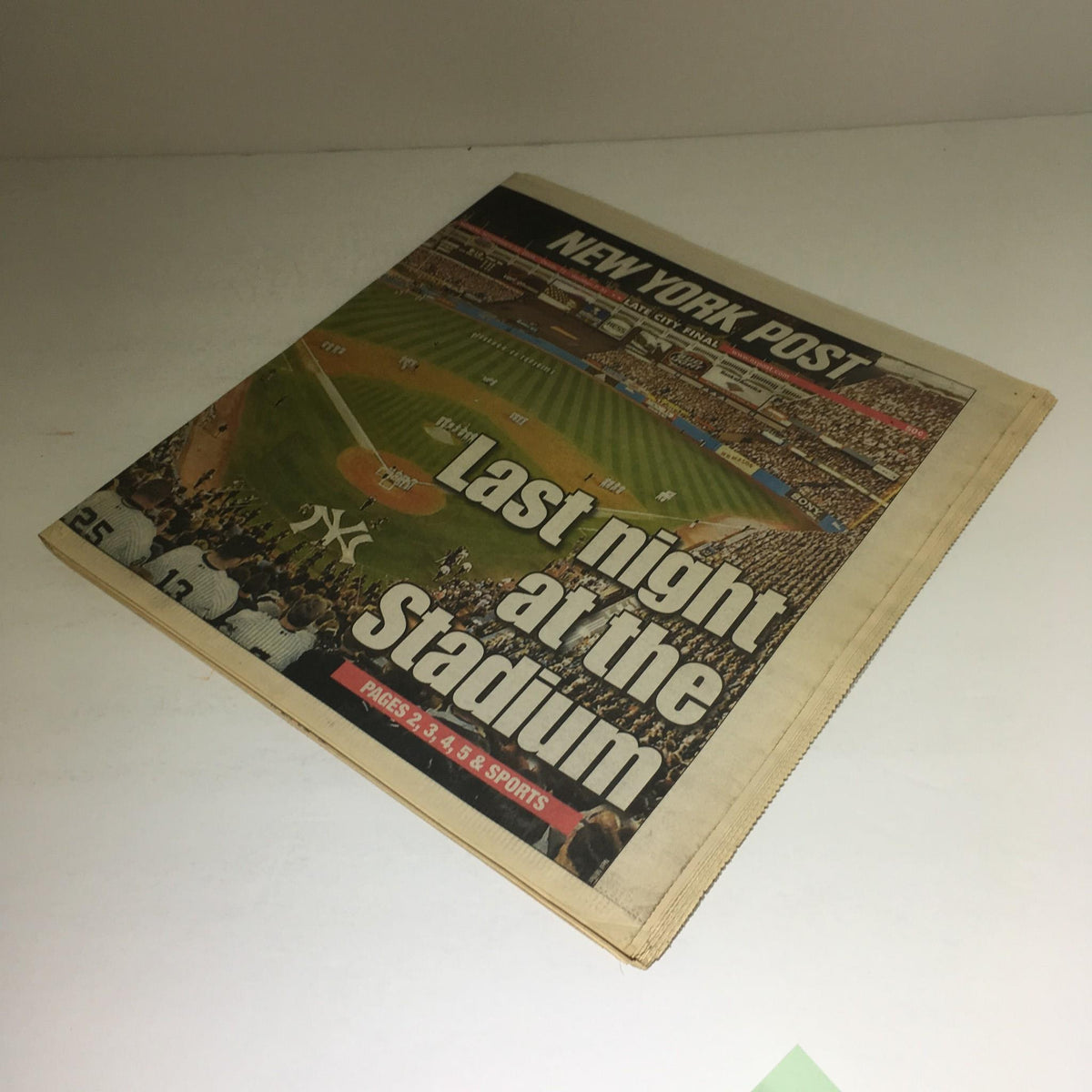 Cover of the 'New York Post: Sept 22, 2008 Last Night at the Stadium', featuring a baseball field and fans, celebrating the historic farewell to the stadium.