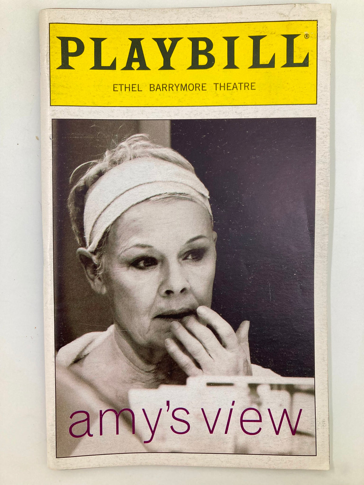 1999 Playbill featuring Judy Dench in 'Amy's View' at the Ethel Barrymore Theatre, with a close-up image of Judy Dench preparing for her role.