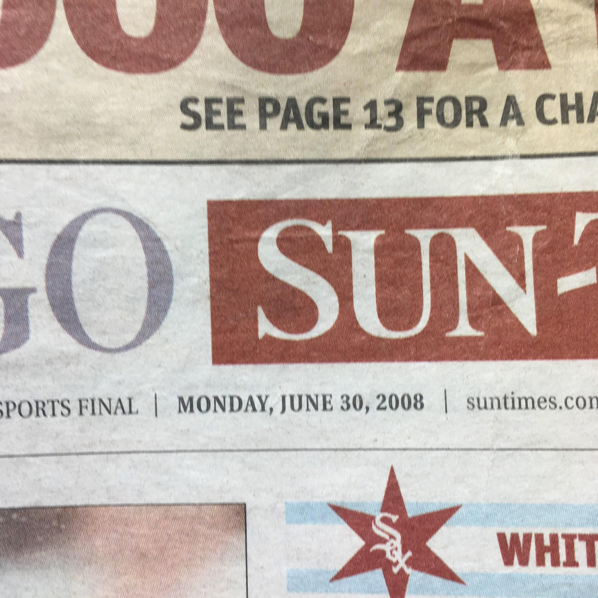 Close-up of the Chicago Sun-Times date and logo, featuring the date June 30, 2008, highlighting the newspaper's vintage quality.