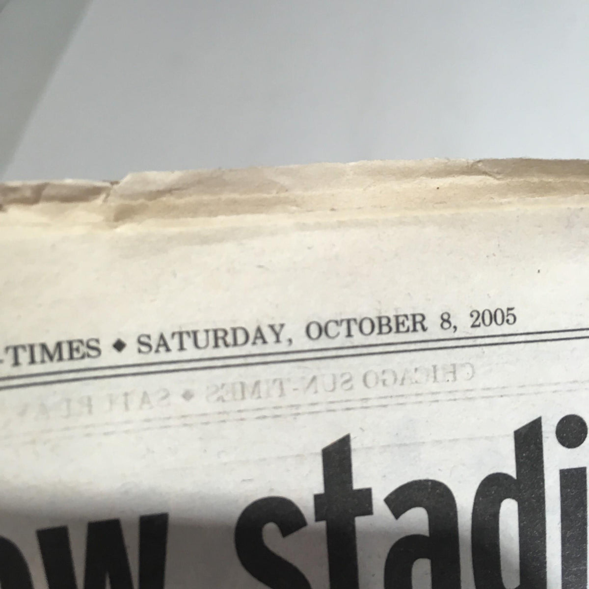 Chicago Sun-Times: Oct 8 2005 date header showcasing 'Saturday, October 8, 2005' at the top of the newspaper.