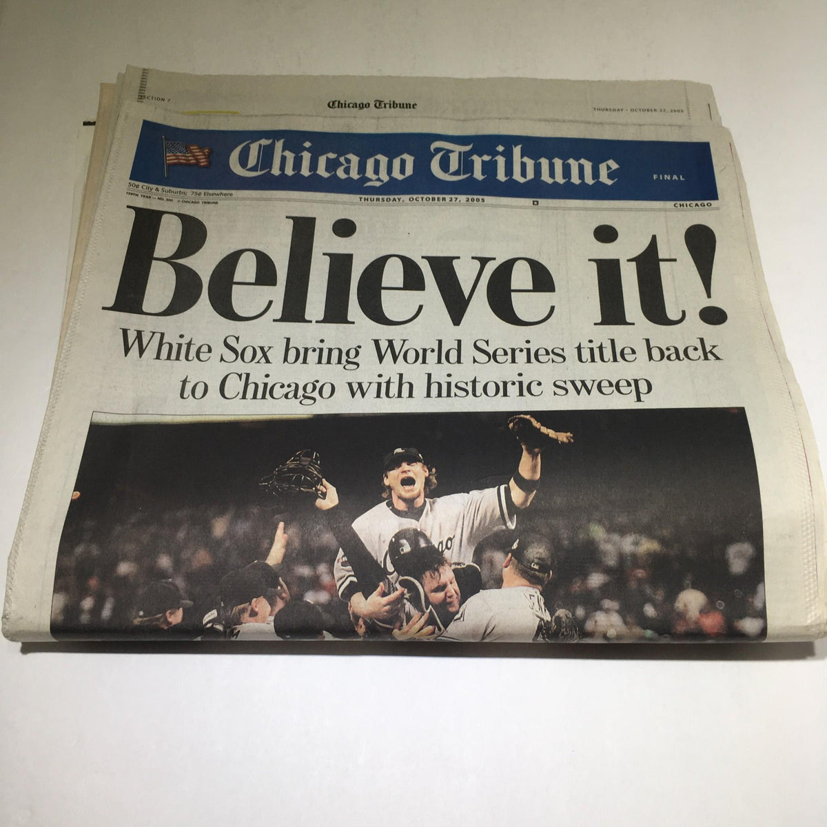 Chicago Tribune headline on October 27, 2005, reading 'Believe it! White Sox bring World Series title back to Chicago with historic sweep' featuring a jubilant player celebration.
