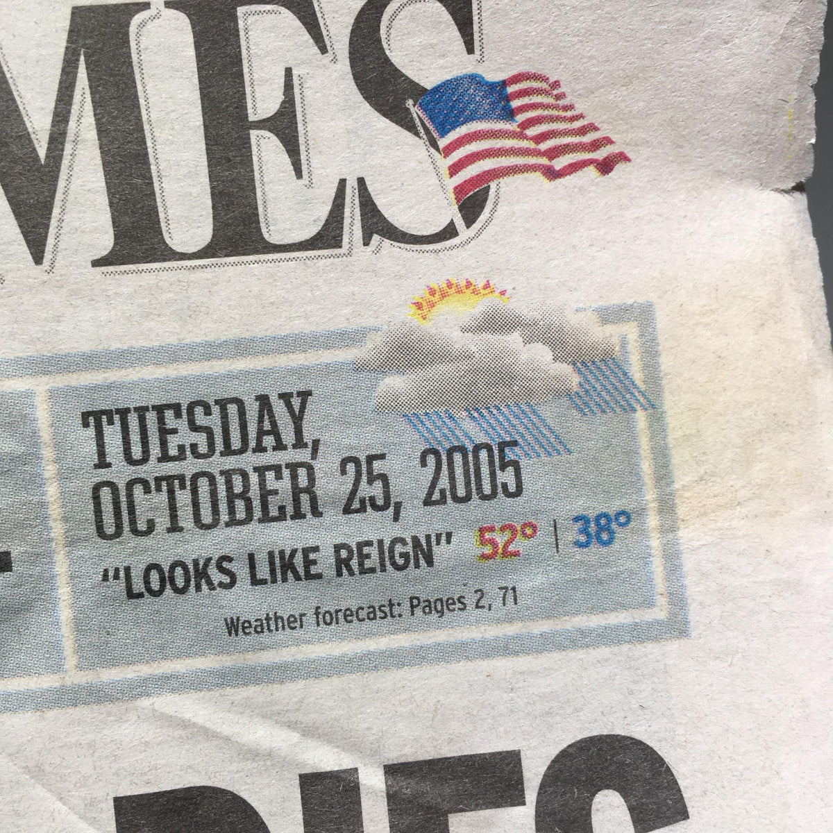 Detail from the Chicago Sun-Times newspaper dated October 25, 2005, displaying the weather forecast and the title 'He Gave Up the Ball Then Made a Big Haul.'
