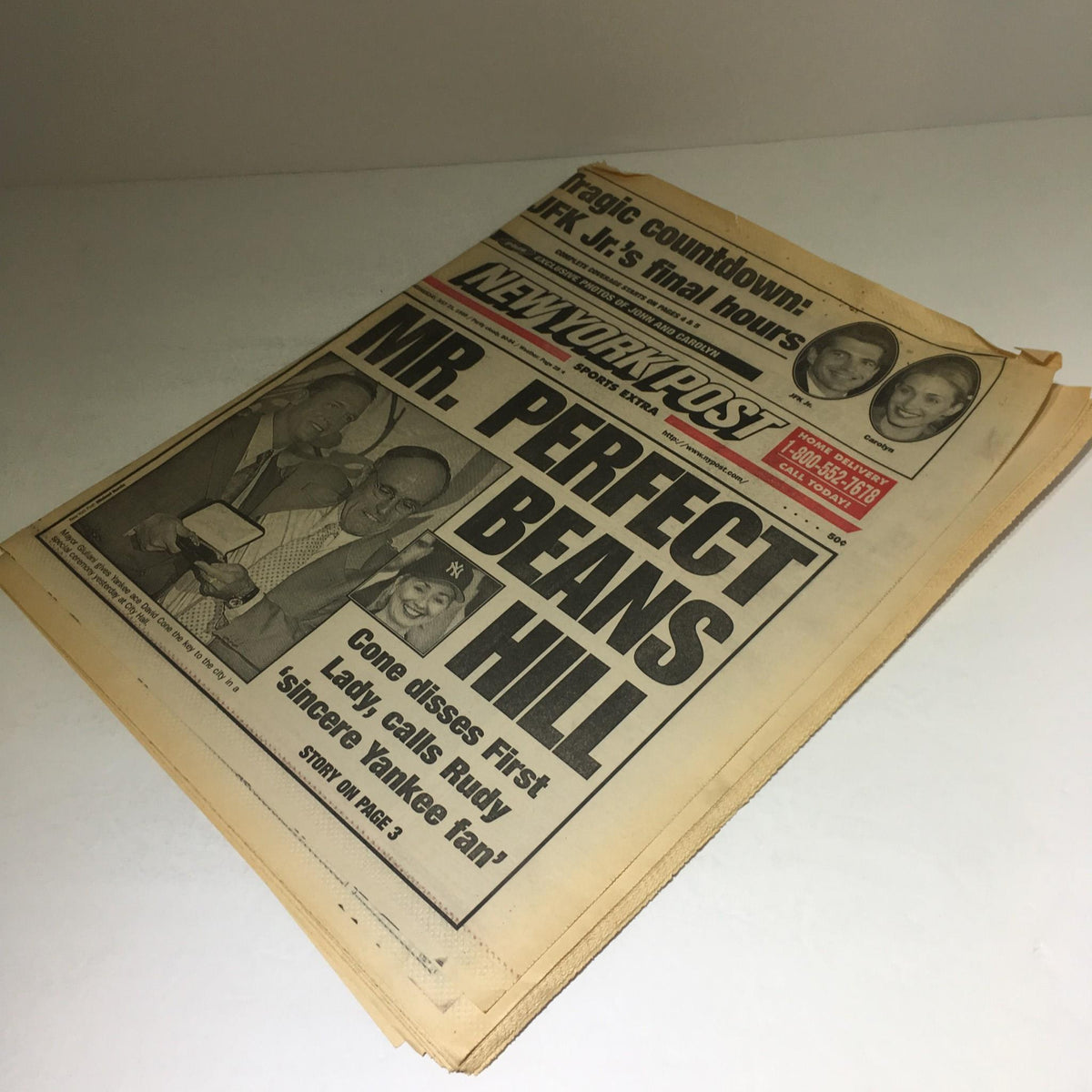 Another view of the New York Post featuring the headline 'Mr. Perfect Beans Hill,' discussing David Cone and a special ceremony attended by Mayor Giuliani.