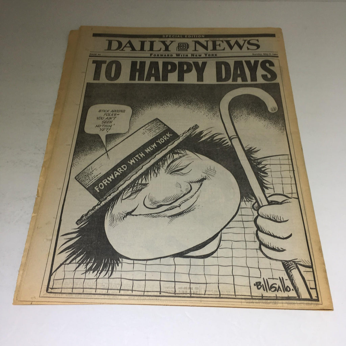 Front cover of the New York Daily News dated May 5, 1991, featuring a cartoon image with the title 'To Happy Days' and the subtitle 'Forward With New York.' This vintage magazine offers a whimsical glimpse into the news of New York City during the early '90s.