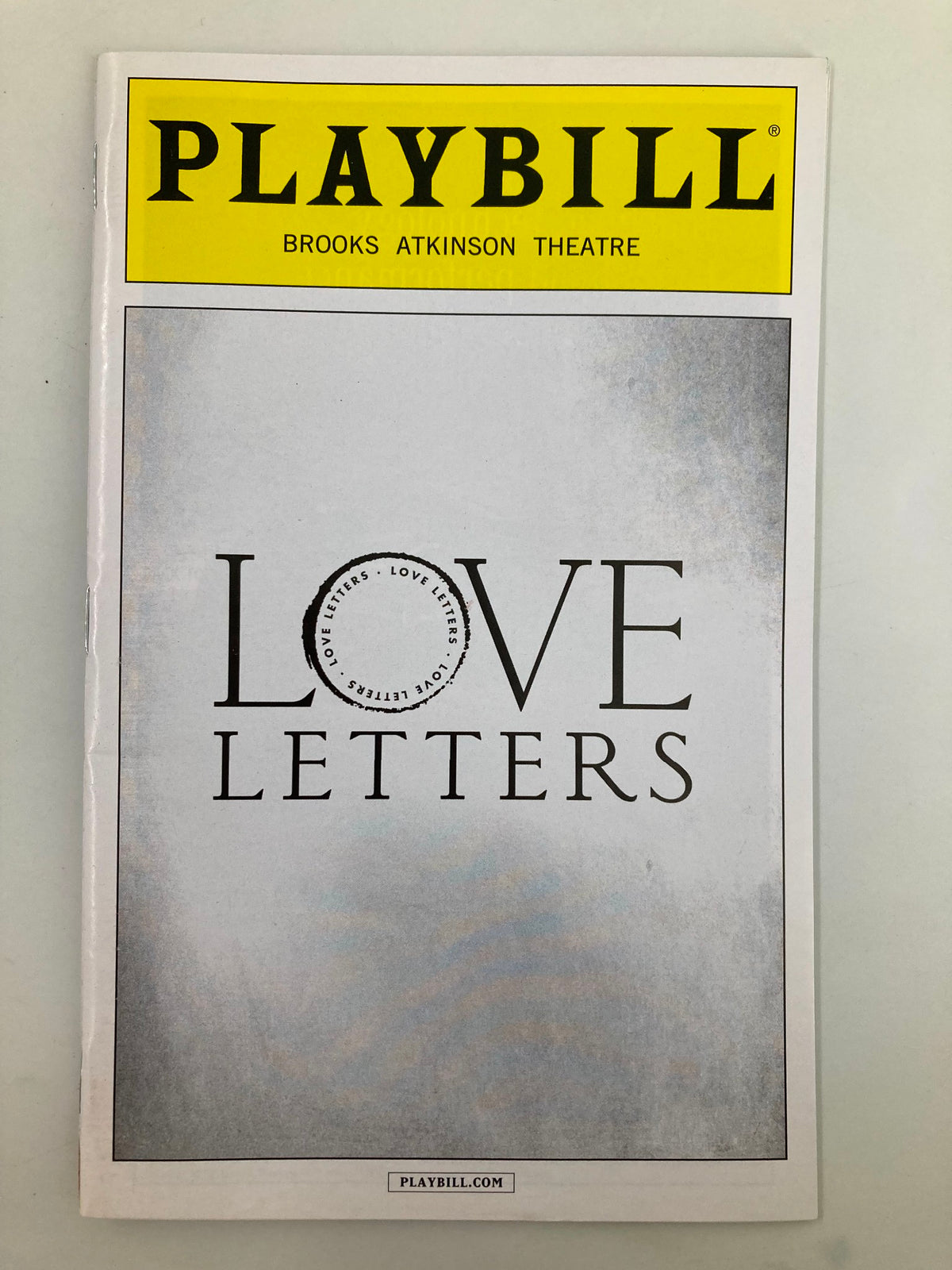 2014 Playbill from Brook Atkinson Theatre for Love Letters featuring a minimalist cover design with the title 'LOVE LETTERS' prominently displayed.