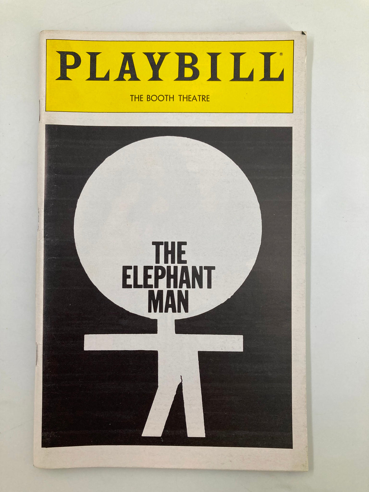 1979 Playbill for The Booth Theatre featuring The Elephant Man, showcasing a minimalist cover design with bold text.