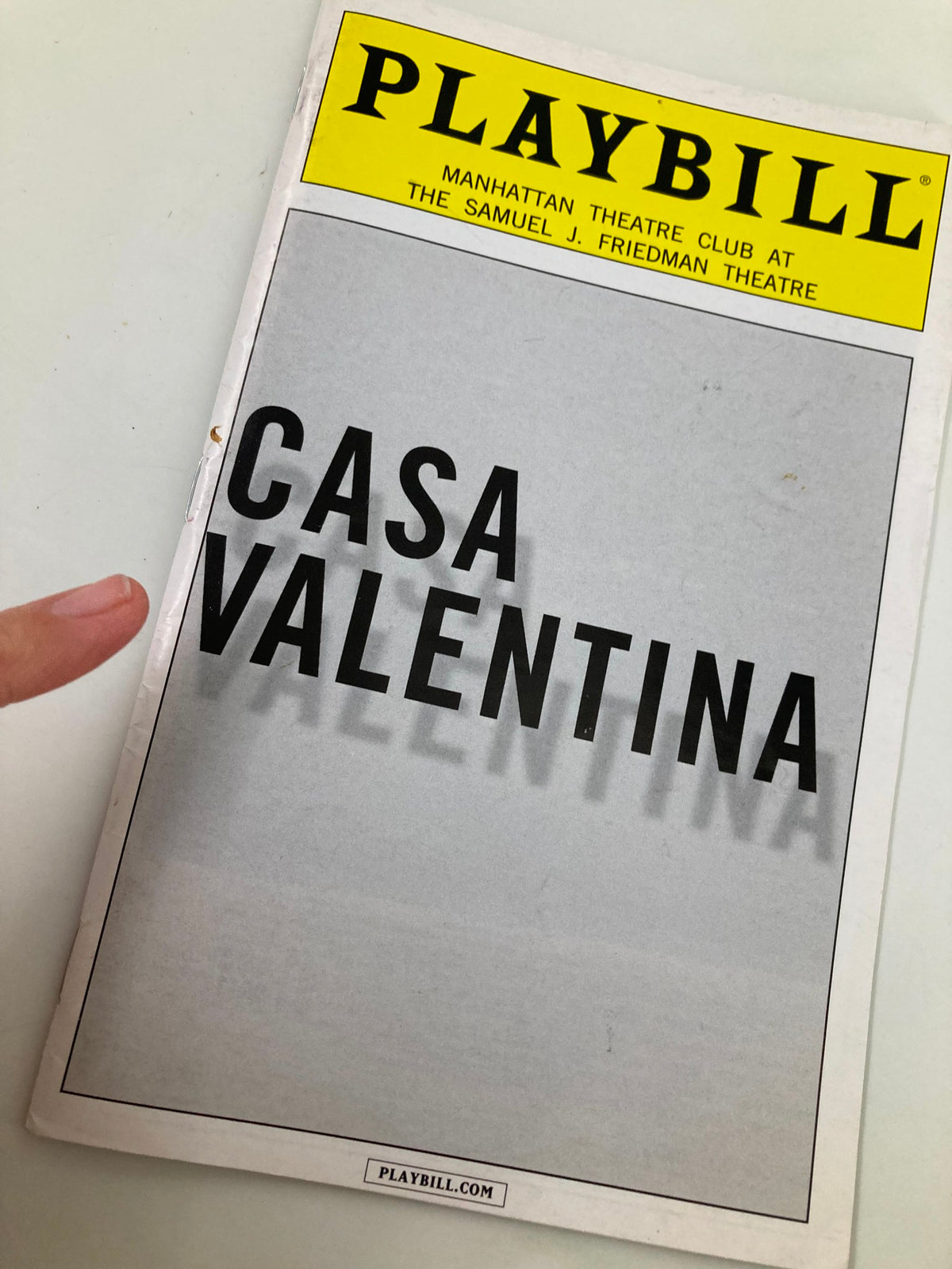 Close-up of the 2014 Playbill for Casa Valentina, presented by the Manhattan Theatre Club, with the title clearly visible.