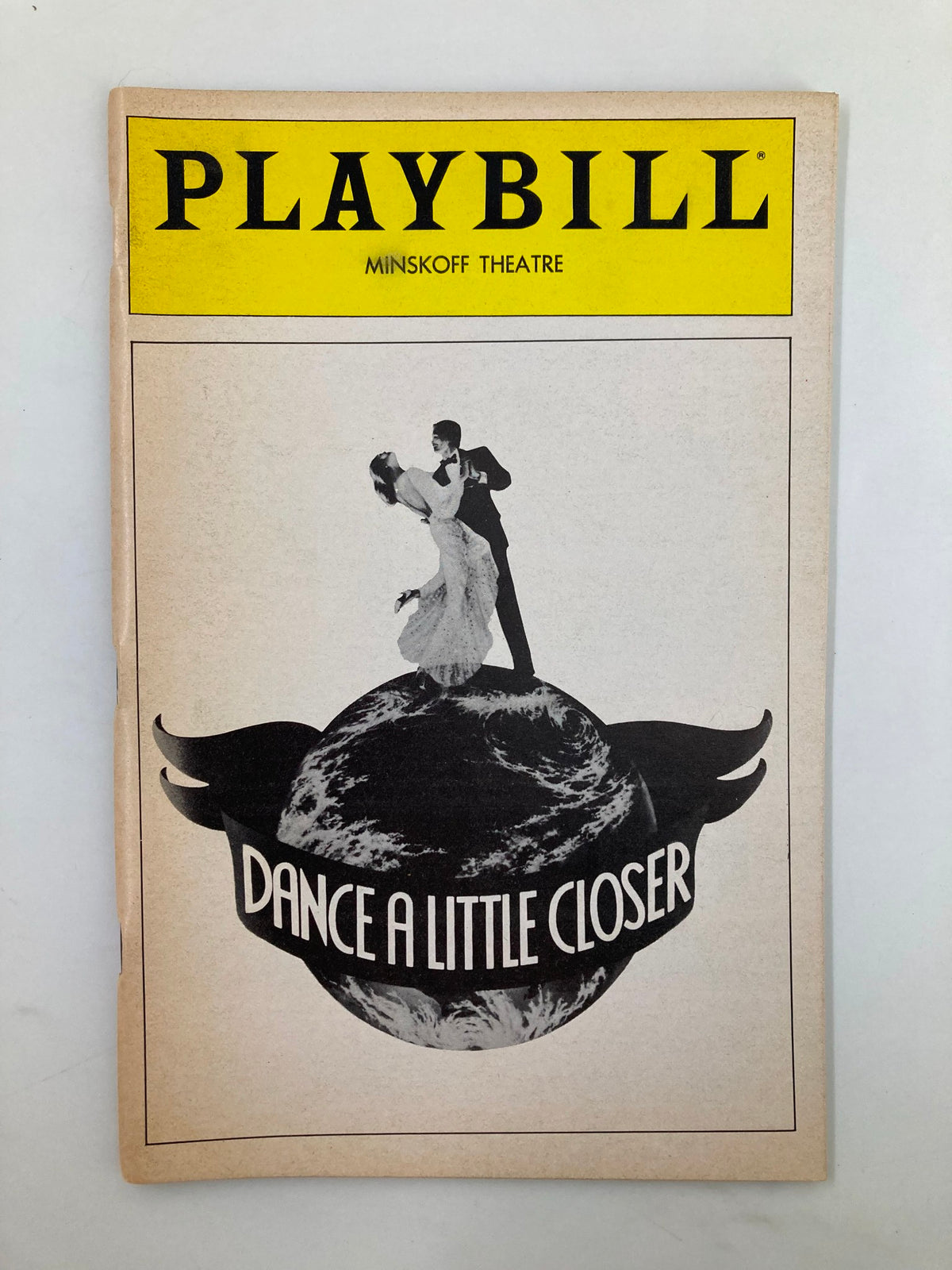 1983 Playbill for the Minskoff Theatre featuring the dance production 'Dance A Little Closer' with a couple dancing on a globe.