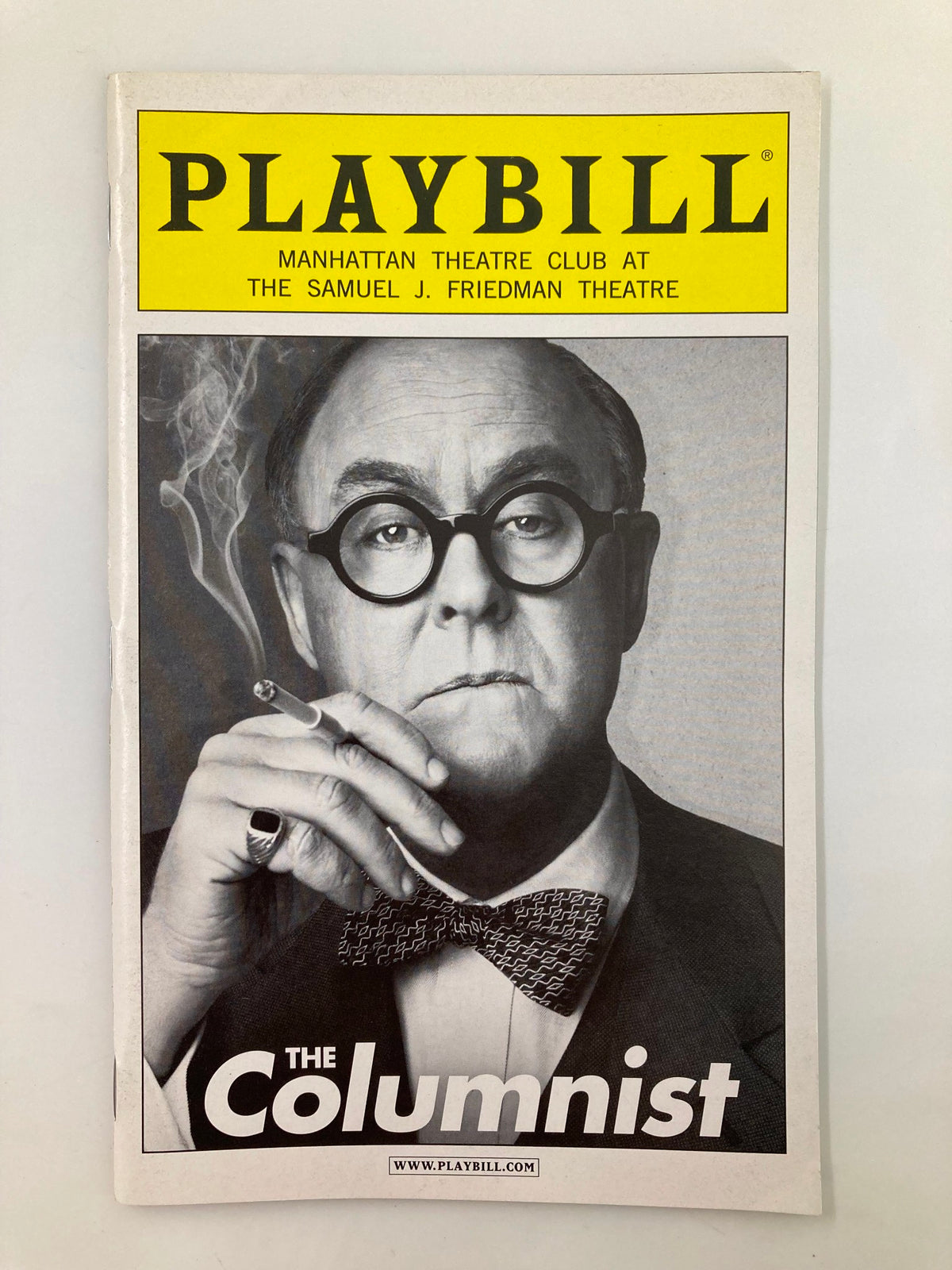 2012 Playbill from Manhattan Theatre Club featuring 'The Columnist' with John Lithgow, showcasing a black and white cover image.
