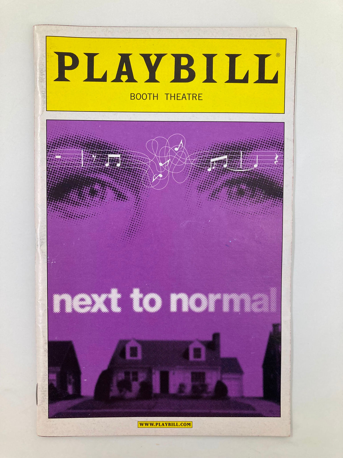 2010 Playbill from the Booth Theatre featuring the musical Next to Normal, showcasing a vivid cover design with stylized imagery and the title prominently displayed.