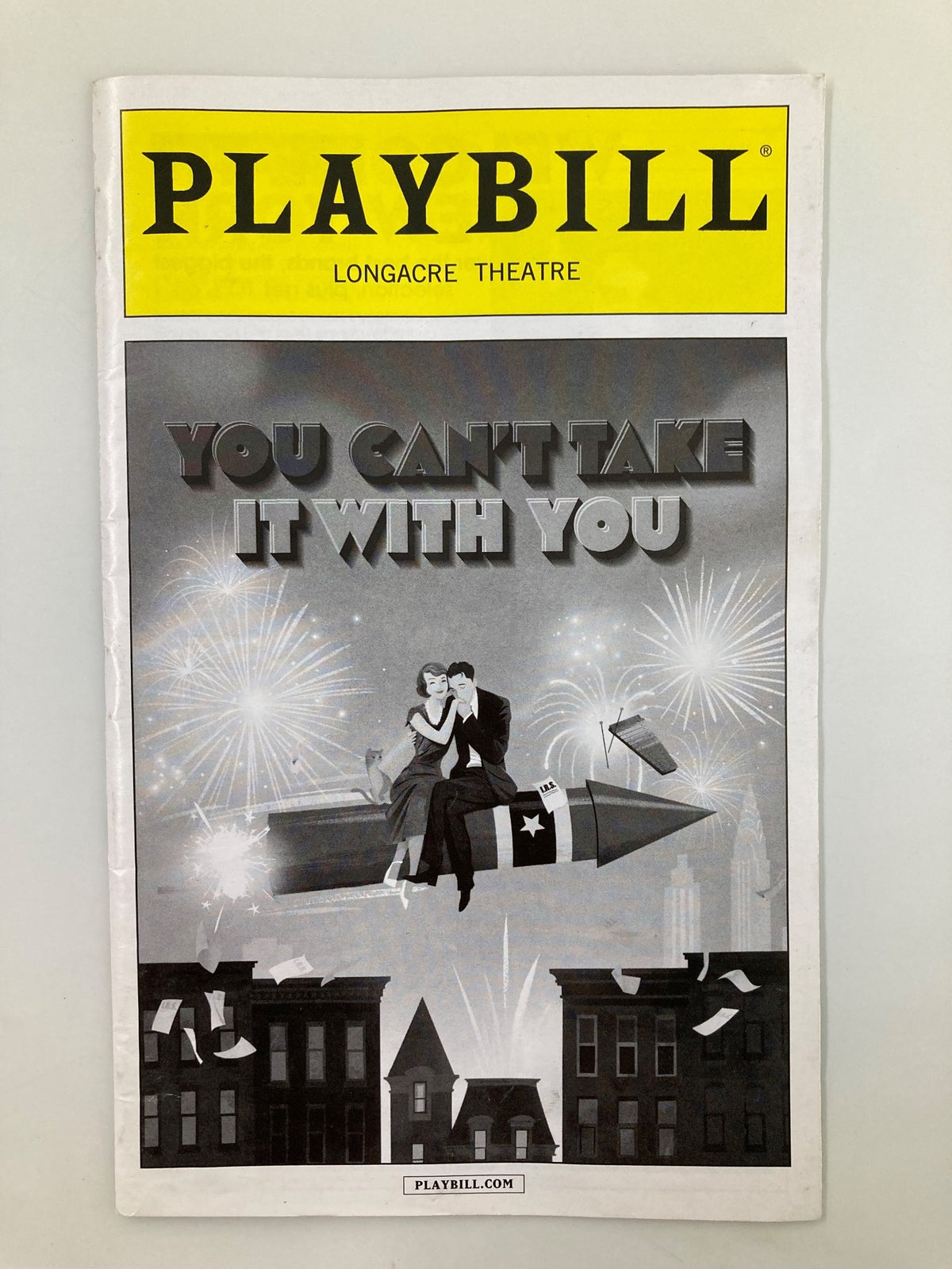You Can't Take It With You Playbill from Longacre Theatre, featuring a classic black and white design with a couple seated on a rocket, surrounded by fireworks, commemorating the 2015 production starring James Earl Jones.