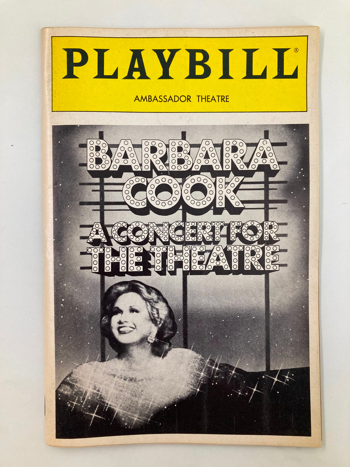 1987 Playbill for Barbara Cook's A Concert for Theatre, featuring a black and white image of Barbara Cook on the cover with the title prominently displayed in light bulbs.