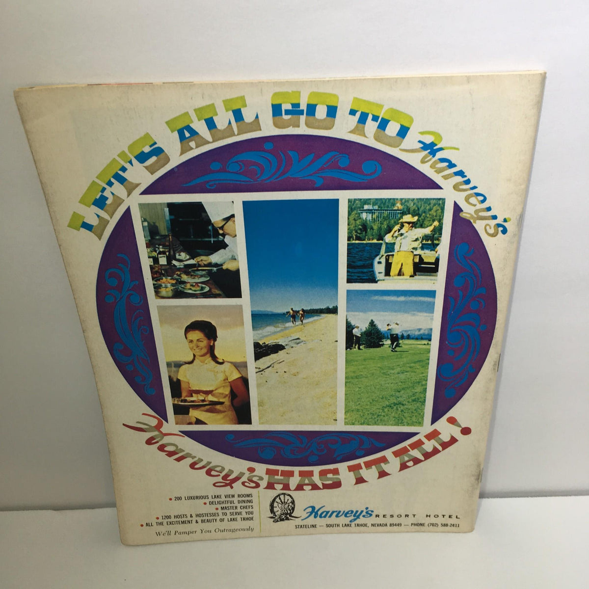 Back cover of 'Nevada Highways and Parks Fall 1969 - The Other Roads To California Magazine' featuring advertisements for Harvey's Resort Hotel and Lake Tahoe attractions.