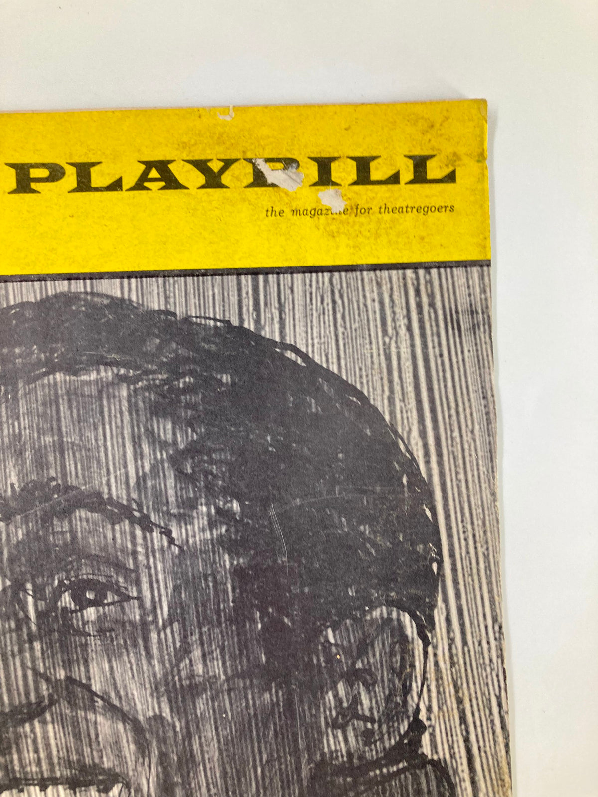 Detailed view of the top section of the 1965 Playbill from Majestic Theatre for The New Musical Golden Boy, depicting vintage design elements.
