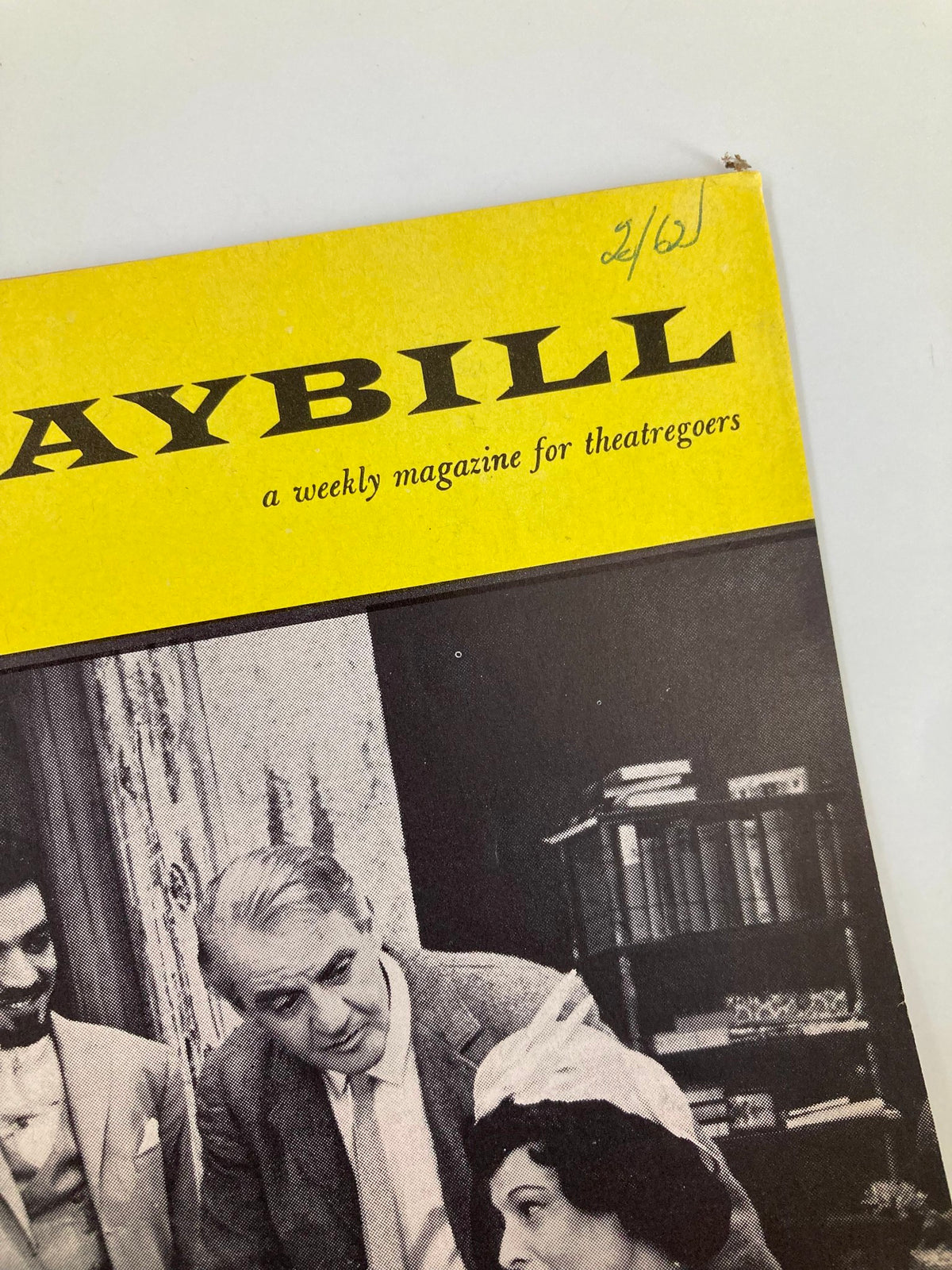 Close-up of the 1962 Playbill for A Passage to India showcasing the front cover with a vintage yellow design.