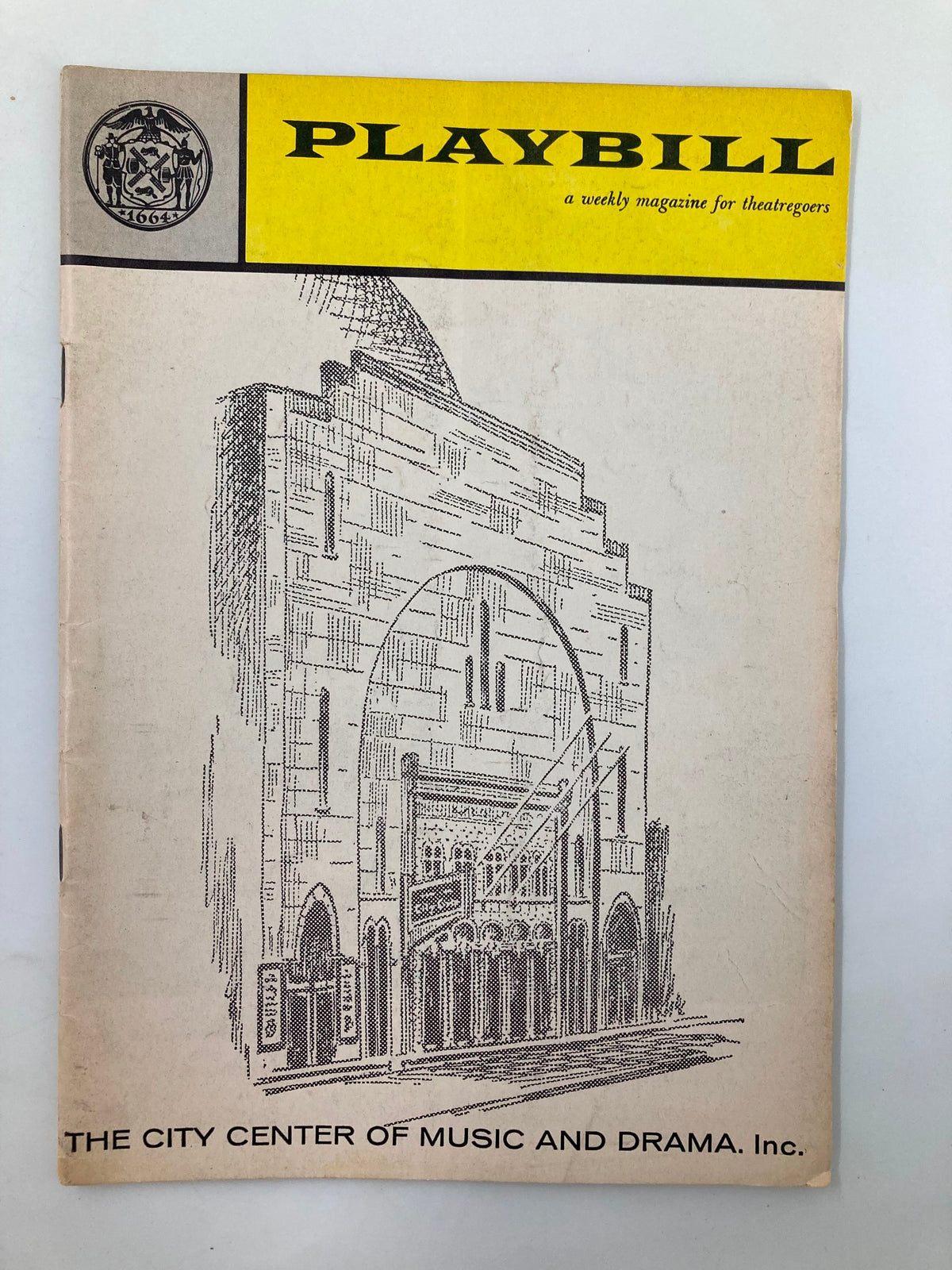 1961 Playbill for Pal Joey featuring the New York City Center, a visually striking cover design that showcases the theater's architectural details.