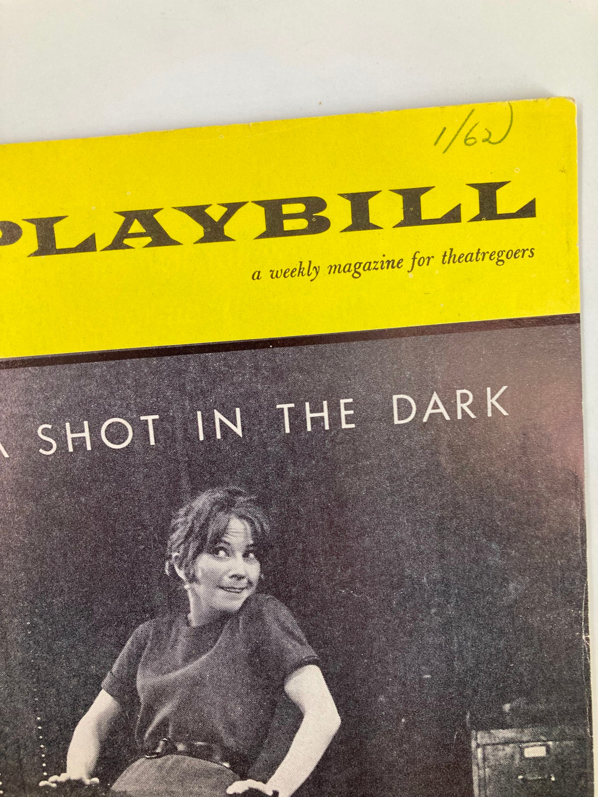 Close-up of the 1962 Playbill The Booth Theatre for A Shot in the Dark, highlighting the title and Julie Harris's image along with a dated handwritten note.