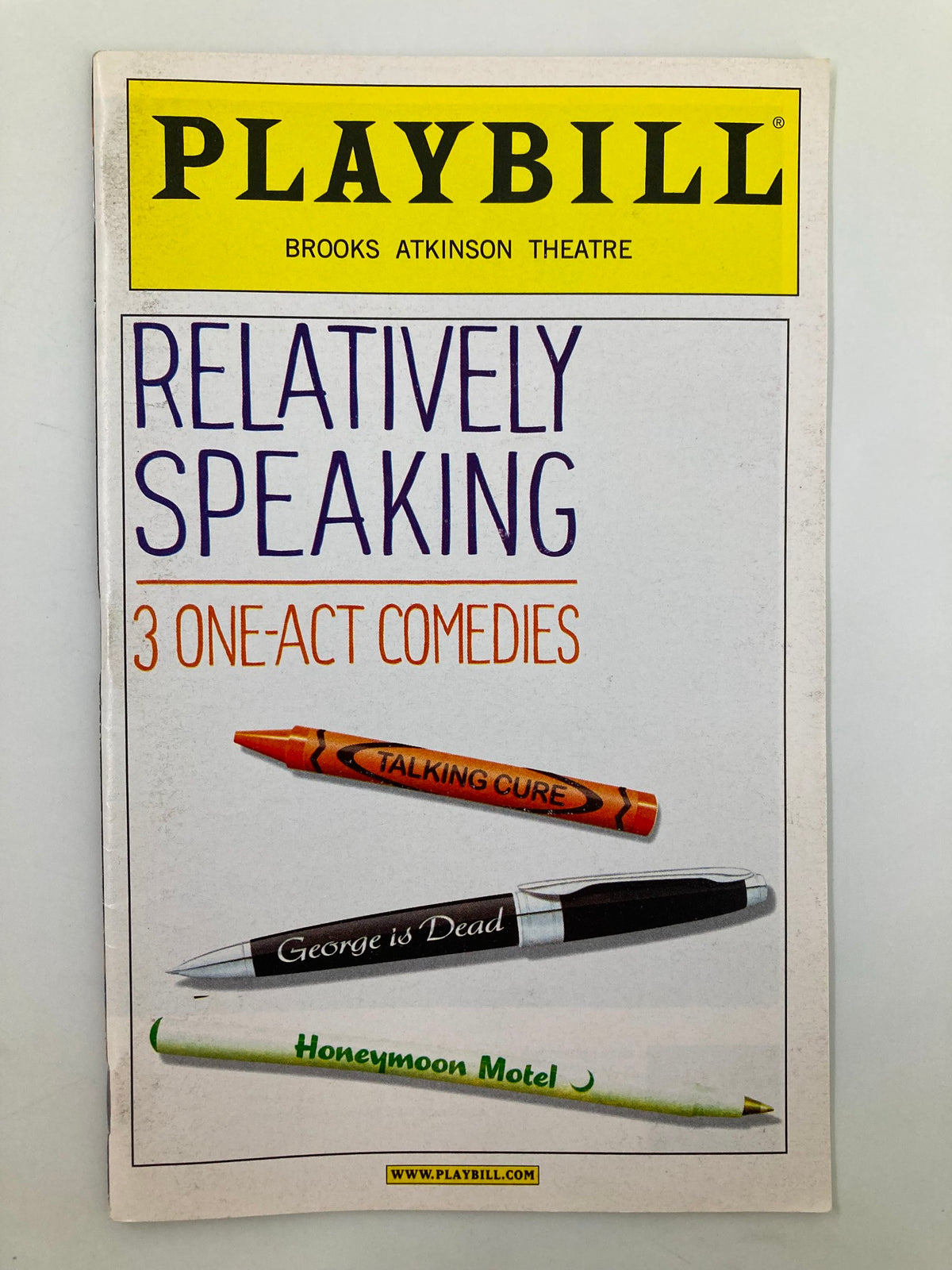 2011 Playbill for 'Relatively Speaking' at Brooks Atkinson Theatre showcasing three one-act comedies, featuring a vibrant cover design with pens and the title prominently displayed.