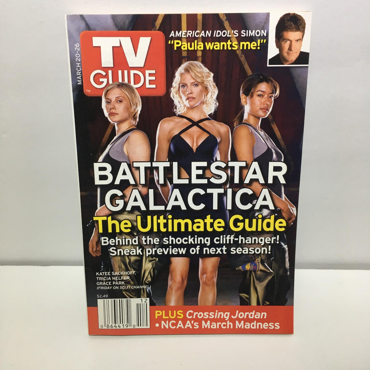 TV Guide from March 20-26, 2005 featuring Katee Sackhoff, Tricia Helfer, and Grace Park on the cover, promoting Battlestar Galactica, with an image of the three actresses.