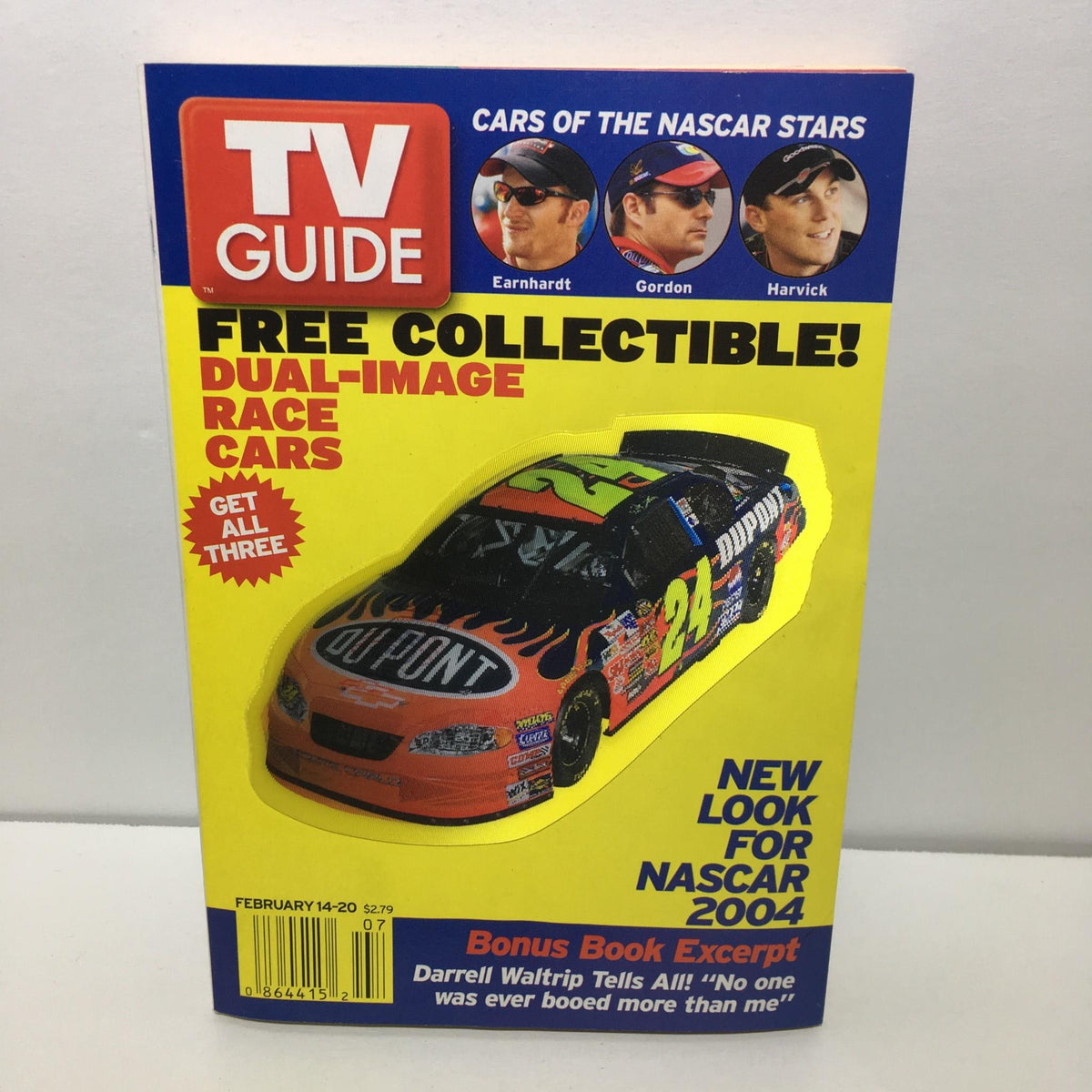 TV Guide February 14-20 Nascar 2004 featuring a vibrant cover showcasing a detailed depiction of a NASCAR race car and images of prominent NASCAR drivers Earnhardt, Gordon, and Harvick.