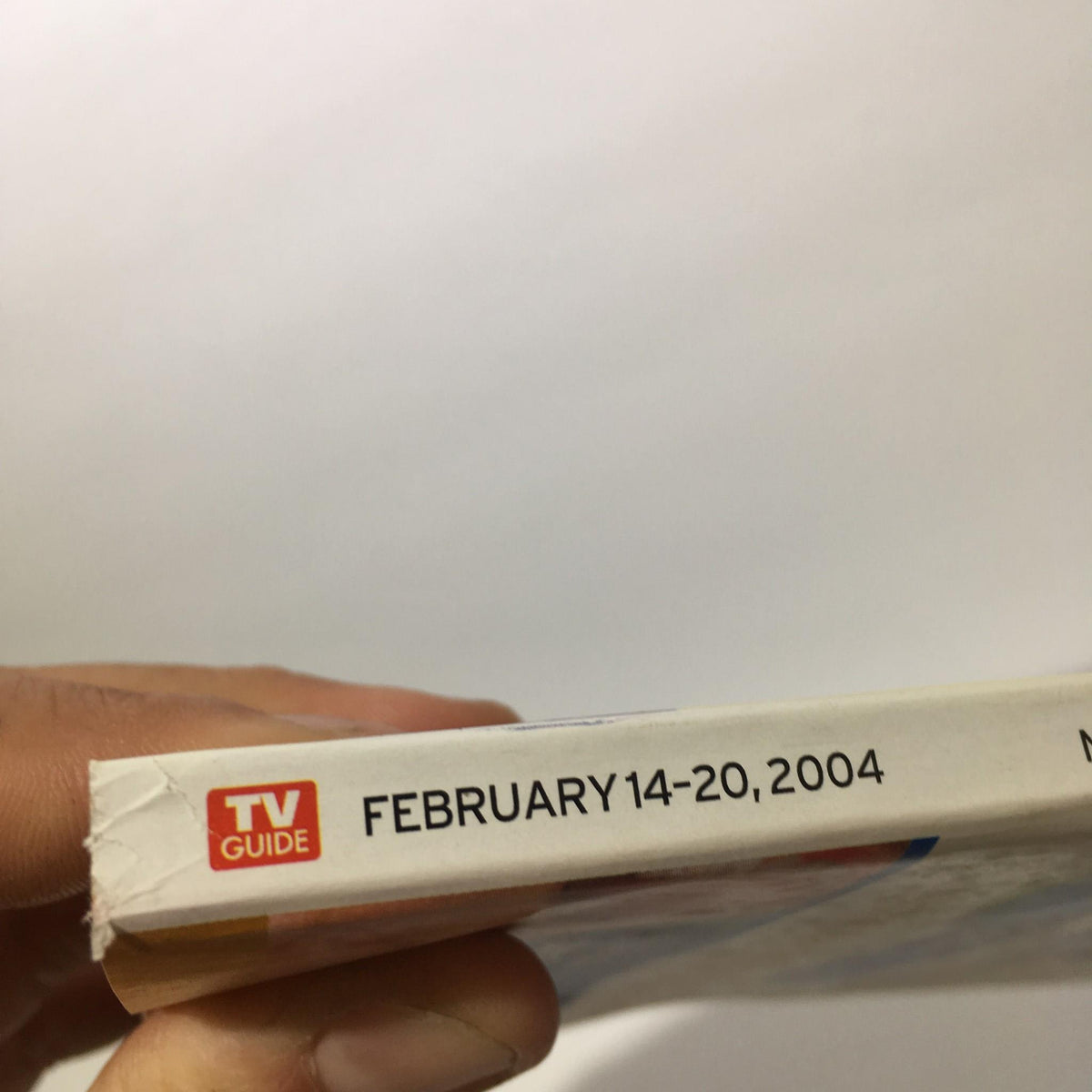 Spine view of the TV Guide February 14-20 Nascar 2004 edition displaying the date and TV Guide logo clearly.