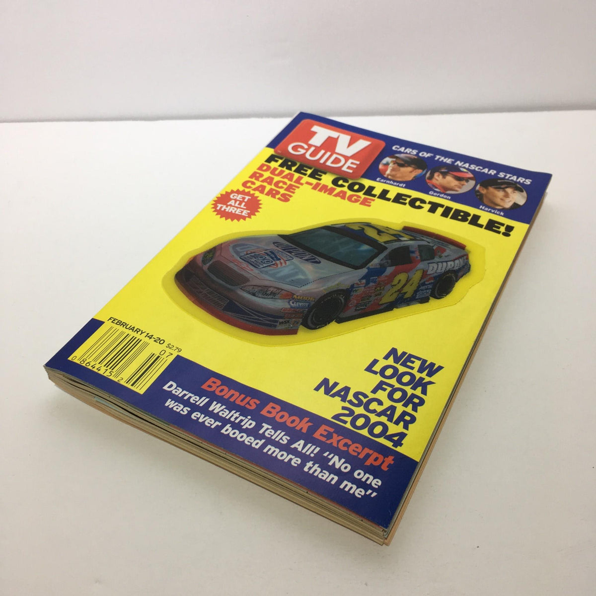 TV Guide February 14-20 Nascar 2004 issue featuring a collectible cover with Nascar car imagery and text highlighting its new look for the 2004 season.