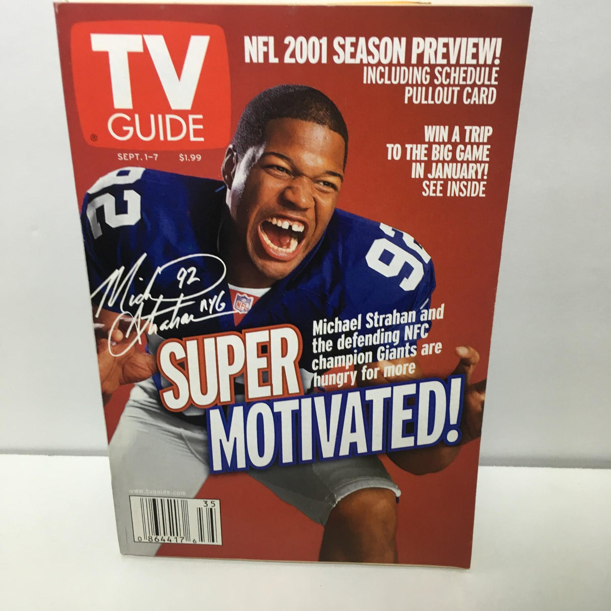 TV Guide cover for Sept 1-7, 2001 featuring Michael Strahan in a New York Giants jersey with text 'Super Motivated' and mentions of NFL 2001 season preview.