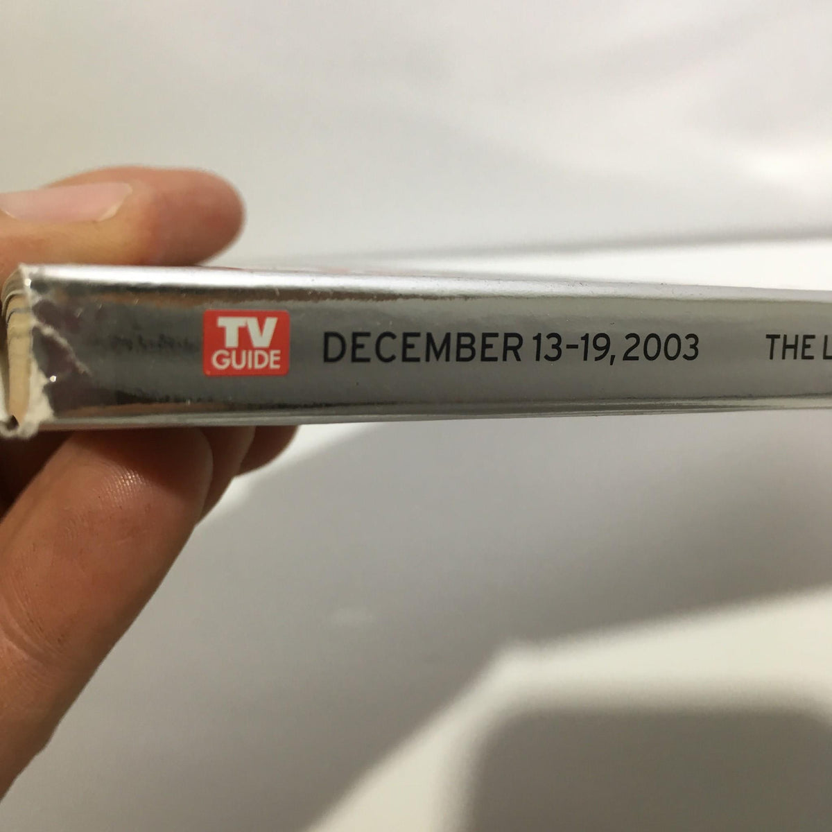 Side view of TV Guide December 13-19, 2003, highlighting 'Lord of the Rings: The Saga Ends' with the date and issue information.