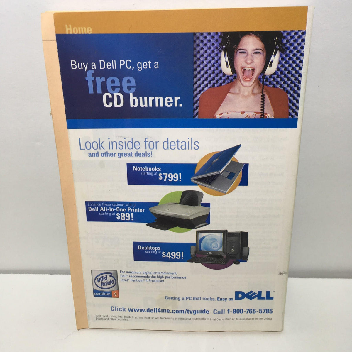 Advertisement on the back cover of TV Guide October 25-31, 2003, promoting Dell PCs and a free CD burner.