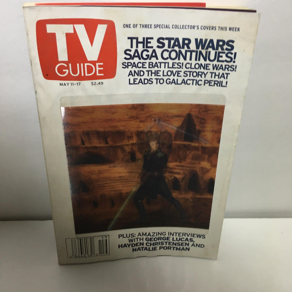 TV Guide May 11-17 2002 Star Wars Saga Cover featuring a dramatic scene with iconic elements from the Star Wars universe, emphasizing space battles and character highlights.