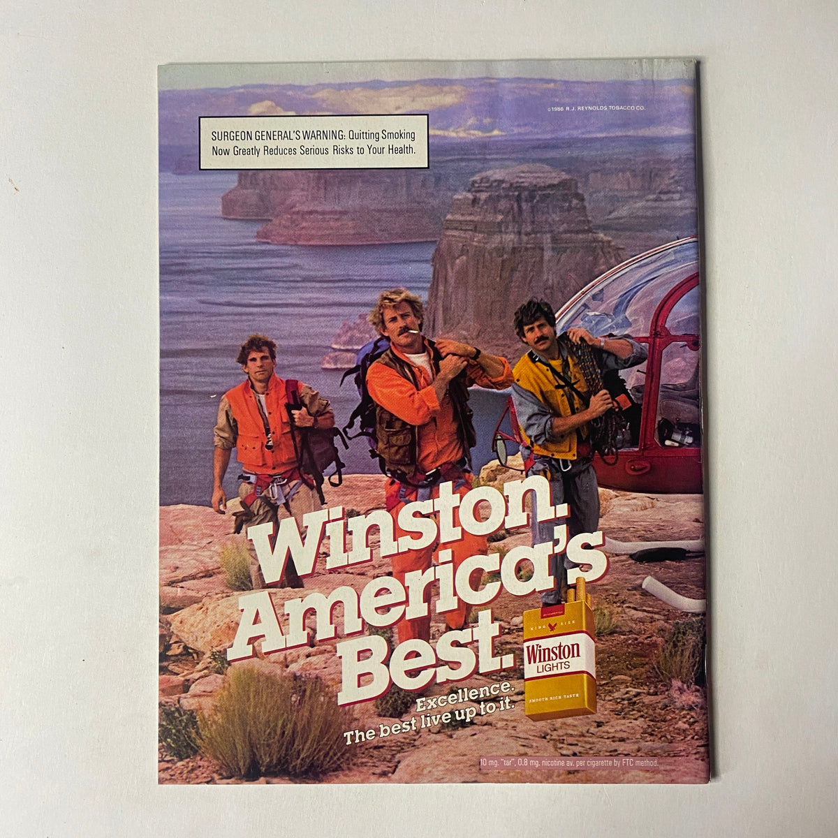 Vintage advertisement for Winston cigarettes, showcasing three men in outdoor gear, with the tagline 'Winston, America's Best' promoting the product.