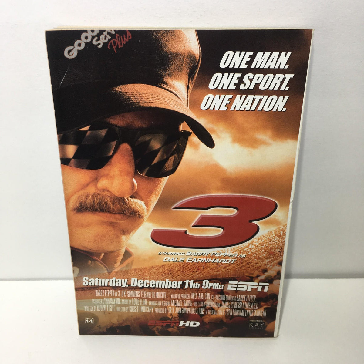 Promotional poster for the movie '3' featuring Barry Pepper as Dale Earnhardt, advertising its airing on December 11th at 9 PM ET on ESPN, emphasizing the tagline 'One Man. One Sport. One Nation.'.