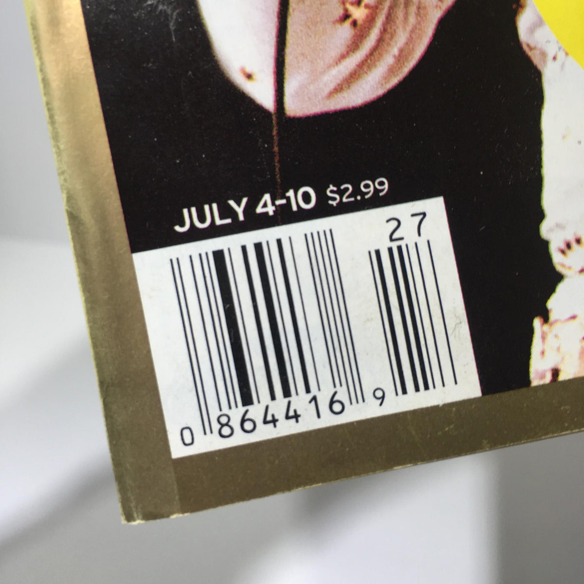 Close-up image of the barcode from TV Guide July 4-10 2004, including the publication date and pricing information for the Elvis Presley edition.